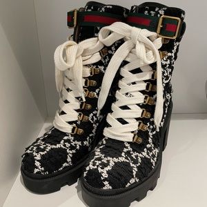 Gucci boots never worn still has tag on the bottom.